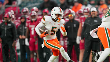 Sep 23, 2023; Philadelphia, Pennsylvania, USA; Miami Hurricanes wide receiver Ray Ray Joseph (5) picks up a first down in the fourth quarter against the Temple Owls at Lincoln Financial Field. Mandatory Credit: Andy Lewis-Imagn Images
