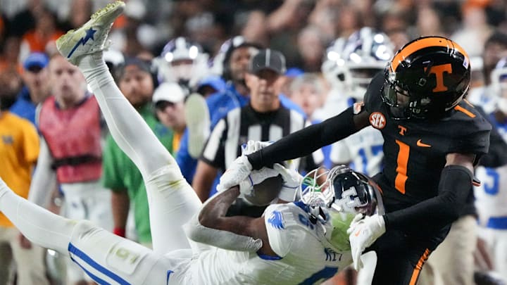 Kentucky wide receiver Dane Key (6) makes the catch while defended by Tennessee defensive back Rickey Gibson III (1) during an NCAA college football game on Saturday, Nov. 2, 2024, in Knoxville, Tenn. (The next few photos are sports action moments from the year. Catches, rebounds, base stealing, these pictures show how athletic athletes are and why taking their photo is as close an out-of-shape photographer like myself will ever get to athleticism.)