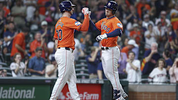 Sep 20, 2024; Houston, Texas, USA; Houston Astros third baseman Alex Bregman (2) celebrates with right fielder Kyle Tucker (30) after hitting a home run during the third inning at Minute Maid Park. Mandatory Credit: Troy Taormina-Imagn Images