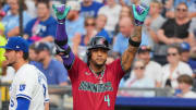 Jul 24, 2024; Kansas City, Missouri, USA; Arizona Diamondbacks second baseman Ketel Marte (4) celebrates toward the dugout against the Kansas City Royals after hitting a single in the first inning at Kauffman Stadium. Mandatory Credit: Denny Medley-USA TODAY Sports