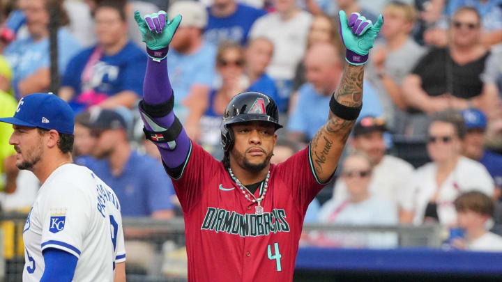 Jul 24, 2024; Kansas City, Missouri, USA; Arizona Diamondbacks second baseman Ketel Marte (4) celebrates toward the dugout against the Kansas City Royals after hitting a single in the first inning at Kauffman Stadium. Mandatory Credit: Denny Medley-USA TODAY Sports