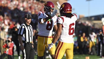 Oct 19, 2024; College Park, Maryland, USA; Southern California Trojans wide receiver Ja'Kobi Lane (8) celebrates with  Trojans wide receiver Makai Lemon (6) after scoring first half touchdown against the Maryland Terrapins  at SECU Stadium. Mandatory Credit: Tommy Gilligan-Imagn Images