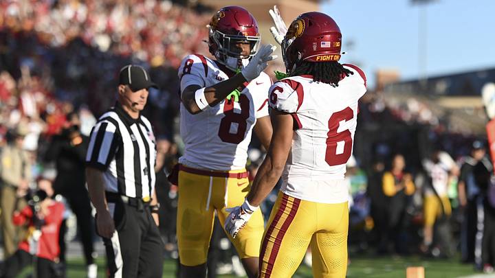 Oct 19, 2024; College Park, Maryland, USA; Southern California Trojans wide receiver Ja'Kobi Lane (8) celebrates with  Trojans wide receiver Makai Lemon (6) after scoring first half touchdown against the Maryland Terrapins  at SECU Stadium. Mandatory Credit: Tommy Gilligan-Imagn Images