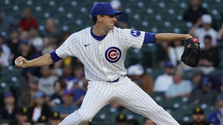 Sep 3, 2024; Chicago, Illinois, USA; Chicago Cubs pitcher Kyle Hendricks (28) throws the ball against the Pittsburgh Pirates during the first inning at Wrigley Field.