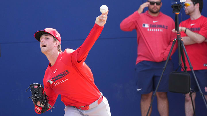 Feb 12, 2025; Jupiter, FL, USA;  St. Louis Cardinals pitcher Quinn Mathews throws during Spring Training. Mandatory Credit: Jim Rassol-Imagn Images