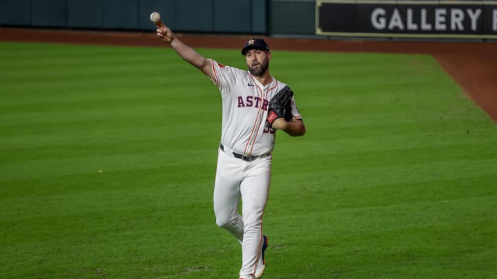 Aug 21, 2024; Houston, Texas, USA;  Houston Astros starting pitcher Justin Verlander (35) warms up before pitching against the Boston Red Sox at Minute Maid Park.