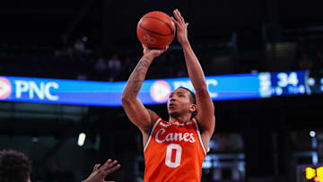 Mar 4, 2025; Atlanta, Georgia, USA; Miami Hurricanes guard Matthew Cleveland (0) shoots against the Georgia Tech Yellow Jackets in the first half at McCamish Pavilion. Mandatory Credit: Brett Davis-Imagn Images
