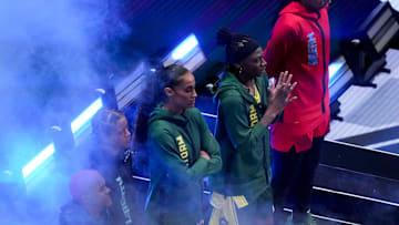 Minnesota Lynx's Courtney Williams (10), New York Liberty's Natasha Cloud (9), Seattle Storm's Skylar Diggins (4), Seattle Storm's Erica Wheeler (17) and Atlanta Dream's Allisha Gray (15) are introduced Friday, July 18, 2025, ahead of the WNBA All-Star skills contest at Gainbridge Fieldhouse in Indianapolis.