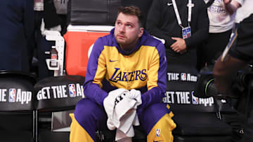 Apr 9, 2025; Dallas, Texas, USA;  Los Angeles Lakers guard Luka Doncic (77) reacts while watching a tribute video before the game against the Dallas Mavericks at American Airlines Center. Mandatory Credit: Kevin Jairaj-Imagn Images