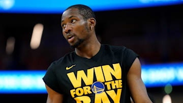 May 12, 2025; San Francisco, California, USA; Golden State Warriors forward Jonathan Kuminga (00) stands on the court during warmups against the Minnesota Timberwolves during Game 4 of the second round for the 2025 NBA Playoffs at Chase Center.