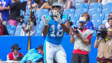 Aug 24, 2024; Orchard Park, New York, USA; Carolina Panthers wide receiver Jalen Coker (18) makes a catch for a touchdown against the Buffalo Bills during the second half at Highmark Stadium. Mandatory Credit: Gregory Fisher-Imagn Images
