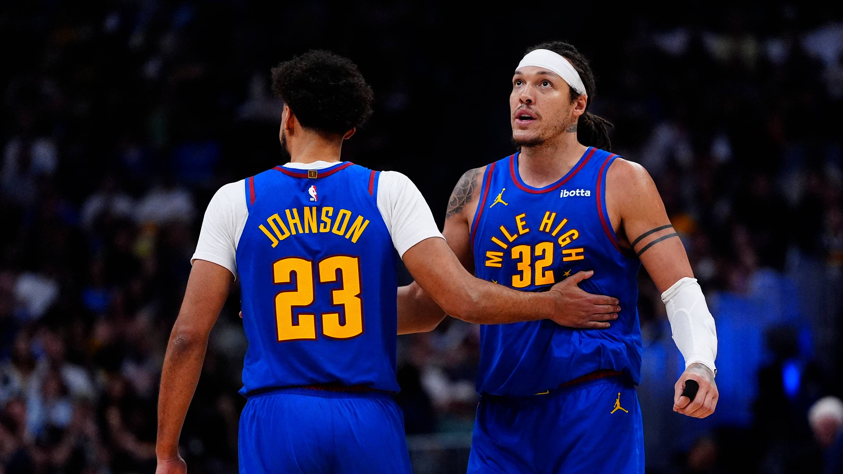 Mar 22, 2026; Denver, Colorado, USA; Denver Nuggets forward Cameron Johnson (23) and forward Aaron Gordon (32) react the third quarter against the Portland Trail Blazers at Ball Arena.