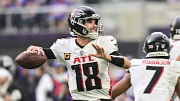 Dec 8, 2024; Minneapolis, Minnesota, USA; Atlanta Falcons quarterback Kirk Cousins (18) throws a pass against the Minnesota Vikings during the second quarter at U.S. Bank Stadium. Mandatory Credit: Jeffrey Becker-Imagn Images