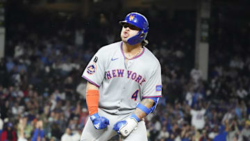 Sep 23, 2025; Chicago, Illinois, USA; New York Mets catcher Francisco Alvarez (4) gestures to the dugout after hitting a two-run home run against the Chicago Cubs during the eighth inning at Wrigley Field. Mandatory Credit: David Banks-Imagn Images