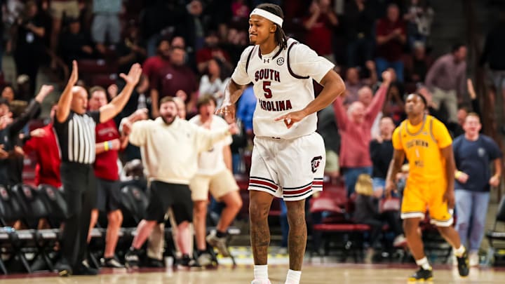 Nov 9, 2025; Columbia, South Carolina, USA; South Carolina Gamecocks guard Meechie Johnson (5) celebrates a three point basket against the Southern Mississippi Golden Eagles in the second half at Colonial Life Arena. Mandatory Credit: Jeff Blake-Imagn Images