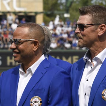 Sep 8, 2024; Chicago, Illinois, USA;  Former Chicago Cubs players Kerry Wood, right, and Aramis Ramirez during a Chicago Cubs Hall of Fame ceremony.