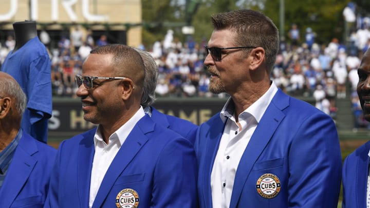 Sep 8, 2024; Chicago, Illinois, USA;  Former Chicago Cubs players Kerry Wood, right, and Aramis Ramirez during a Chicago Cubs Hall of Fame ceremony.