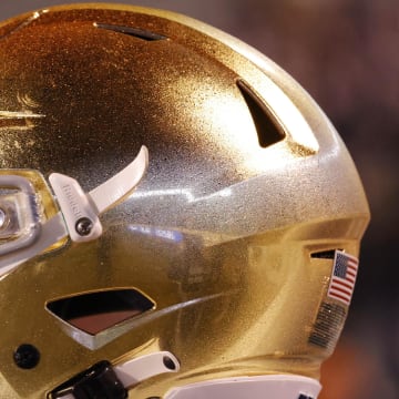 Nov 13, 2021; Charlottesville, Virginia, USA; A view of a Notre Dame Fighting Irish player's helmet on the sidelines against the Virginia Cavaliers at Scott Stadium. 