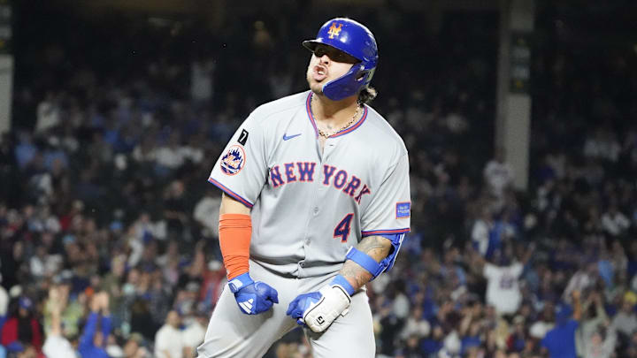 Sep 23, 2025; Chicago, Illinois, USA; New York Mets catcher Francisco Alvarez (4) gestures to the dugout after hitting a two-run home run against the Chicago Cubs during the eighth inning at Wrigley Field. Mandatory Credit: David Banks-Imagn Images