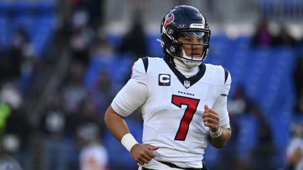 Houston Texans quarterback C.J. Stroud (7) warms up before a 2024 AFC divisional round game against the Baltimore Ravens 