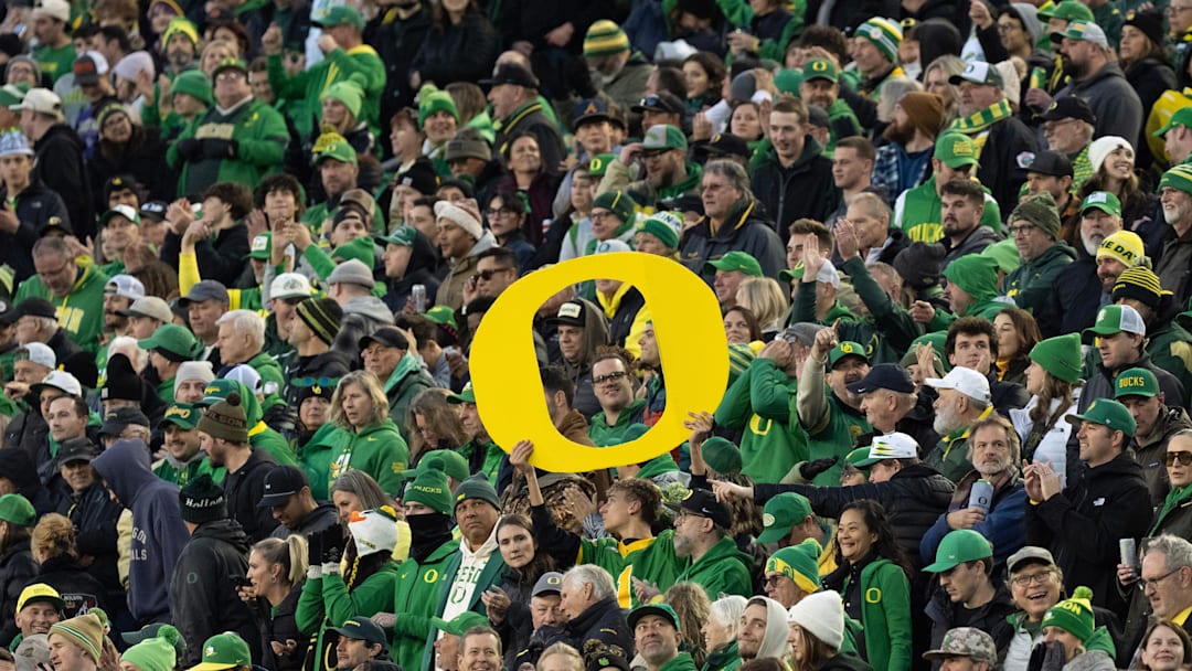 Oregon fans cheer the Ducks during the first half against James Madison at Autzen Stadium in Eugene Dec. 20, 2025.