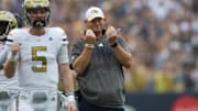 Sep 14, 2024; Atlanta, Georgia, USA; Georgia Tech Yellow Jackets head coach Brent Key reacts after a touchdown against the Virginia Military Institute Keydets in the second quarter at Bobby Dodd Stadium at Hyundai Field. Mandatory Credit: Brett Davis-Imagn Images