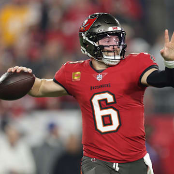 Jan 12, 2025; Tampa, Florida, USA; Tampa Bay Buccaneers quarterback Baker Mayfield (6) throws during the first quarter of a NFC wild card playoff against the Washington Commanders at Raymond James Stadium. Mandatory Credit: Nathan Ray Seebeck-Imagn Images