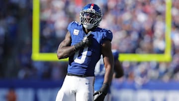 Sep 28, 2025; East Rutherford, New Jersey, USA; New York Giants linebacker Brian Burns (0) celebrates after sacking Los Angeles Chargers quarterback Justin Herbert (10) (not pictured) during the fourth quarter at MetLife Stadium. Mandatory Credit: Brad Penner-Imagn Images