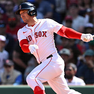 Apr 24, 2025; Boston, Massachusetts, USA; Boston Red Sox third base Alex Bregman (2) hits a RBI single against the Seattle Mariners during the third inning at Fenway Park. Mandatory Credit: Brian Fluharty-Imagn Images