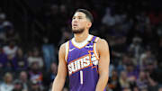 Nov 27, 2024; Phoenix, Arizona, USA; Phoenix Suns guard Devin Booker (1) looks on against the Brooklyn Nets during the first half at Footprint Center. Mandatory Credit: Joe Camporeale-Imagn Images