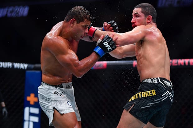 Robert Whittaker moves in with a hit against Paulo Costa during UFC 298 at Honda Center. 