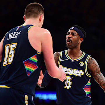 Apr 3, 2022; Los Angeles, California, USA; Denver Nuggets forward Will Barton (5) reacts with center Nikola Jokic (15) against the Los Angeles Lakers during the second half at Crypto.com Arena. Mandatory Credit: Gary A. Vasquez-Imagn Images