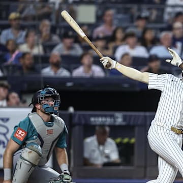 Jul 9, 2025; Bronx, New York, USA;  New York Yankees second baseman Jazz Chisholm Jr. (13) hits a two run home run in the fifth inning against the Seattle Mariners at Yankee Stadium. Mandatory Credit: Wendell Cruz-Imagn Images