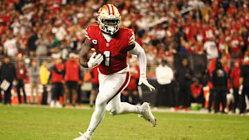 Oct 27, 2024; Santa Clara, California, USA; San Francisco 49ers wide receiver Deebo Samuel Sr (1) carries the ball against the Dallas Cowboys during the third quarter at Levi's Stadium.