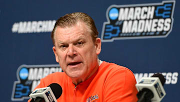 Mar 20, 2025; Milwaukee, WI, USA;  Illinois Fighting Illini head coach Brad Underwood speaks at press conference during NCAA Tournament First Round Practice at Fiserv Forum. Mandatory Credit: Benny Sieu-Imagn Images