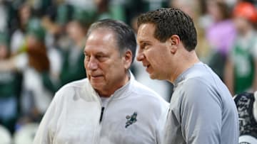 Former Michigan State player Mat Ishbia, right, talks with head coach Tom Izzo before the game against Maryland on Saturday, Feb. 3, 2024, at the Breslin Center in East Lansing.