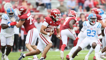 Nov 2, 2024; Fayetteville, Arkansas, USA; Arkansas Razorbacks quarterback Malachi Singleton (3) rushes in the fourth quarter against the Ole Miss Rebels at Donald W. Reynolds Razorback Stadium. Mississippi won 63-31. Mandatory Credit: Nelson Chenault-Imagn Images