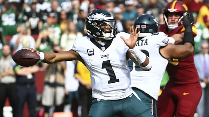 Oct 29, 2023; Landover, Maryland, USA; Philadelphia Eagles quarterback Jalen Hurts (1) attempts a pass against the Washington Commanders during the first half at FedExField. Mandatory Credit: Brad Mills-Imagn Images