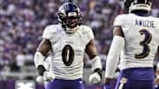 Nov 9, 2025; Minneapolis, Minnesota, USA; Baltimore Ravens linebacker Roquan Smith (0) reacts with cornerback Chidobe Awuzie (3) during the third quarter against the Minnesota Vikings at U.S. Bank Stadium. Mandatory Credit: Jeffrey Becker-Imagn Images