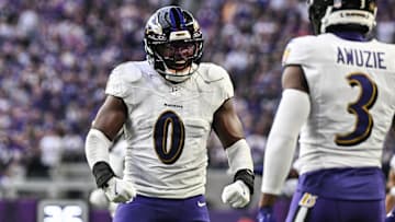 Nov 9, 2025; Minneapolis, Minnesota, USA; Baltimore Ravens linebacker Roquan Smith (0) reacts with cornerback Chidobe Awuzie (3) during the third quarter against the Minnesota Vikings at U.S. Bank Stadium. Mandatory Credit: Jeffrey Becker-Imagn Images