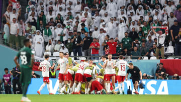 Poland celebrate a group stage victory against Saudi Arabia