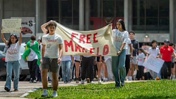 Milford High School students walk out of school in support of Marcelo Gomes, June 2, 2025.