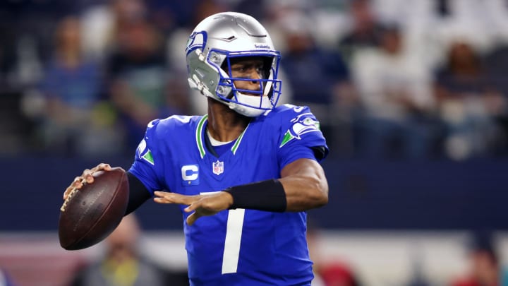 Nov 30, 2023; Arlington, Texas, USA; Seattle Seahawks quarterback Geno Smith (7) looks to pass against the Dallas Cowboys during the first half at AT&T Stadium. Mandatory Credit: Tim Heitman-USA TODAY Sports