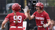 Stanford’s Taryn Kern, left, celebrates the first score of the fame with teammate 	Jade Berry during first inning of the Eugene NCAA Softball Regional May 17, 2025.