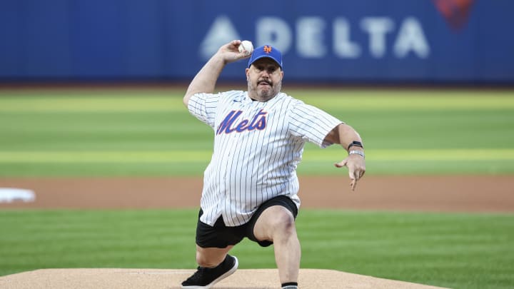 Aug 20, 2024; New York City, New York, USA;  Comedian and actor Kevin James throws out the first pitch prior to the game between the Baltimore Orioles and the New York Mets at Citi Field. Mandatory Credit: Wendell Cruz-USA TODAY Sports