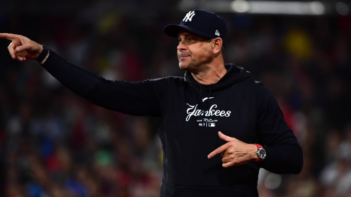 Jun 15, 2024; Boston, Massachusetts, USA;  New York Yankees manager Aaron Boone asks for a replay during the eighth inning against the Boston Red Sox at Fenway Park. Mandatory Credit: Bob DeChiara-USA TODAY Sports