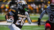 Sept 13, 2025; Columbia, Missouri, USA; Missouri Tigers running back Jamal Roberts rushes during a play in the second quarter at Faurot Field.