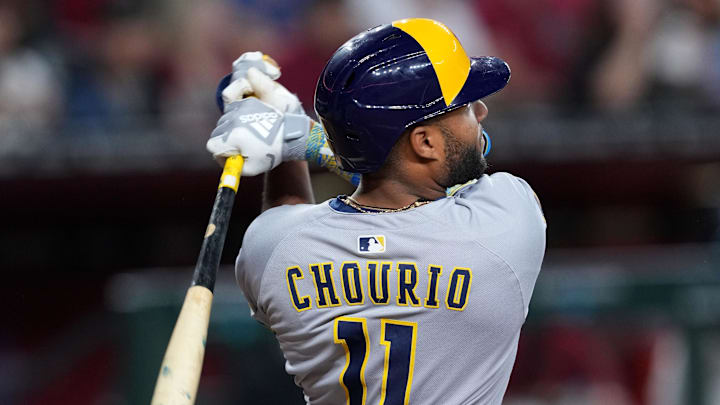 Milwaukee Brewers outfielder Jackson Chourio (11) hits a solo home run against the Arizona Diamondbacks during the sixth inning at Chase Field on April 12. Milwaukee Brewers outfielder Jackson Chourio (11) hits a solo home run against the Arizona Diamondbacks during the sixth inning at Chase Field on April 12.