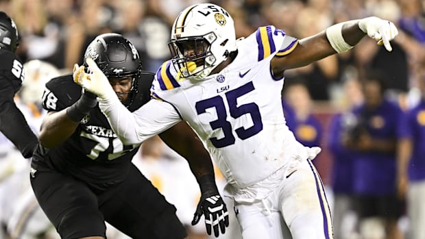LSU Tigers defensive end Sai'vion Jones (35) defends in coverage during the third quarter against the Texas A&M Aggies. 