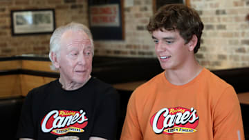 Arch And Archie Manning Work A Pre-Manning Passing Academy "Shift" With LSU Quarterback
